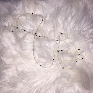 Long silver and black necklace